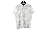 Etro Polo T-Shirt luxury authentic floral pattern Designer fashion Luxury polo shirt Italian design Stylish polo shirt High-end menswear Premium craftsmanship Iconic brand Sophisticated casualwear Fashionable polo shirt Designer menswear Exclusive polo shirt Fashion statement
