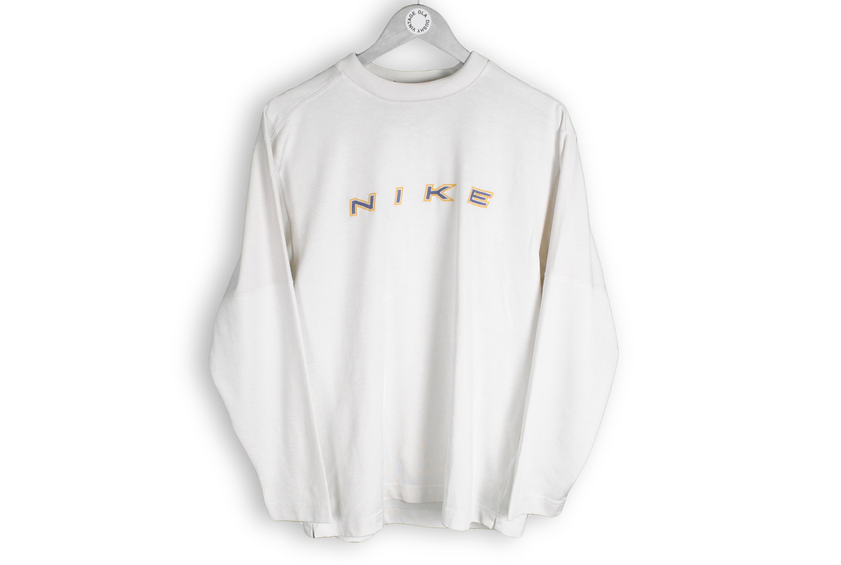 Cream vintage best sale nike sweatshirt