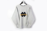 Vintage Notre Dame Fighting Irish Champion Sweatshirt Medium / Large gray college sport 90s university team Football Basketball jumper