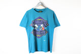 Vintage Charlotte Hornets T-Shirt Medium / Large sport team big logo NBA 90s blue tee