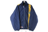 Vintage Notre Dame Fighting Irish University Jacket Medium / Large blue yellow college 90s 80s retro basketball football softball windbreaker big logo USA