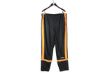 Vintage Adidas Track Pants Medium black orange 90s retro sport trousers classic basketball style