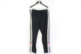 Vintage Adidas Track Pants XLarge / XXLarge black 90's big logo snap buttons