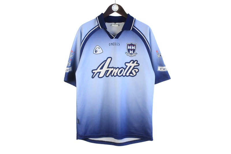 Chemise vintage Dublin GAA O'Neills bleu Arnotts manches Chemise vintage Dublin GAA O'Neills bleu Arnotts manches
