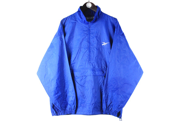Vintage Reebok Anorak Jacket XLarge blue small logo windbreaker 90s half zip sport style jacket