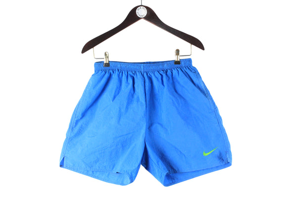 Vintage Nike Shorts Medium blue big logo 90s retro sport style swimming shorts
