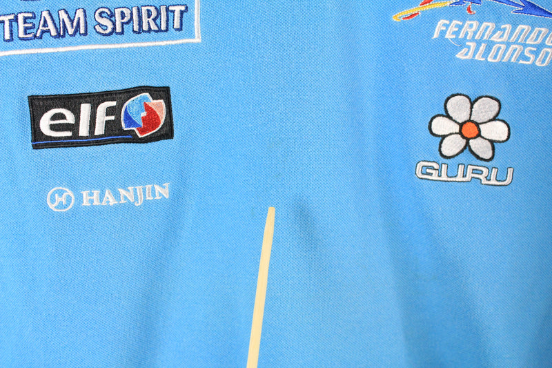 Maillot de F1 Formule 1 Alpine 2021 signé par Fernando Alonso | LCS Maillot de F1 Formule 1 Alpine 2021 signé par Fernando Alonso | LCS