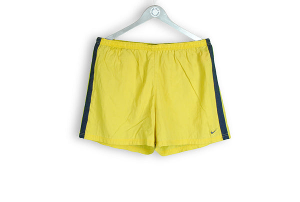 vintage nike yellow shorts