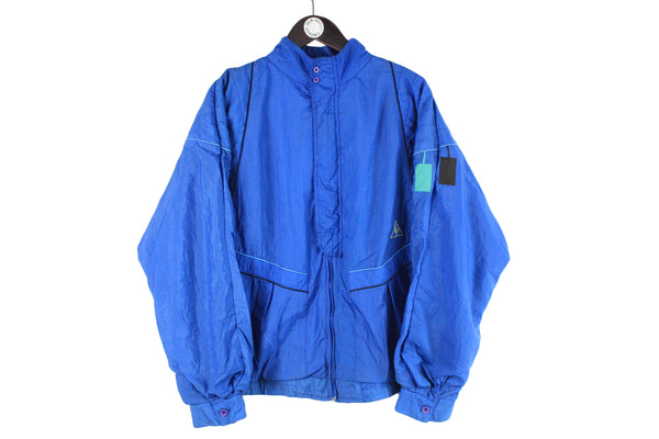 Vintage Le Coq Sportif Track Jacket blue 80s retro windbreaker sport France brand