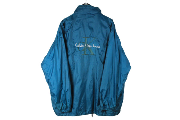 Vintage Calvin Klein Bootleg Jacket XXLarge blue big logo 90s windbreaker oversize sportswear USA hip hop