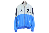 Vintage Nike Track Jacket sport full zip retro 80's style wear blue front logo long sleeve collared athletic clothing