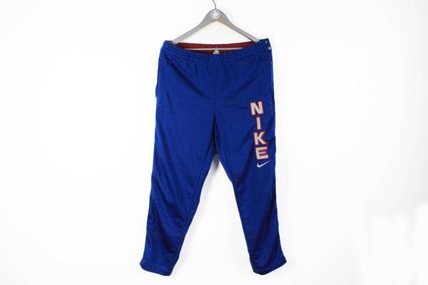 Vintage Nike Track Pants Large blue big logo 90s athletic snap button sport pants
