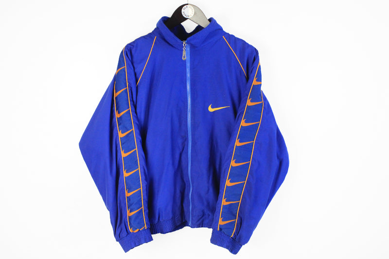 Vintage Nike Bootleg Track Jacket Small / Medium blue full swoosh logo 90's sport style windbreaker
