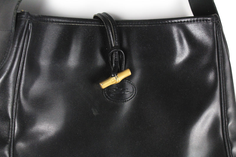 Longchamp Vintage handbag in black smooth leather. Worn…