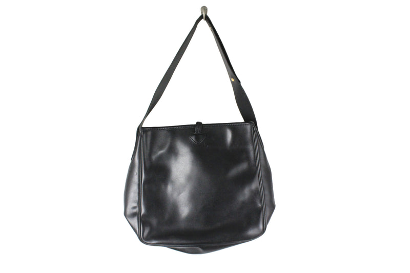 Longchamp Vintage handbag in black smooth leather. Worn…
