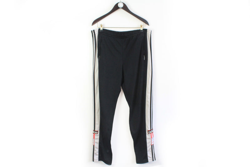Vintage Adidas Track Pants XLarge / XXLarge black 90's big logo snap buttons 